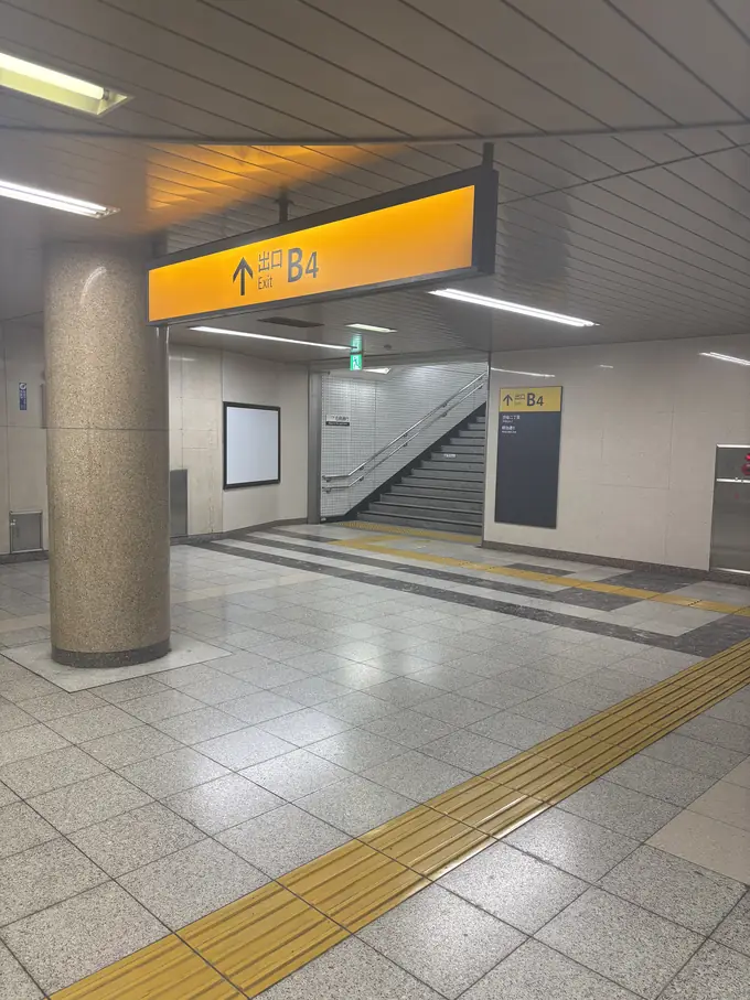 Signs to exit B4 inside Shibuya Station